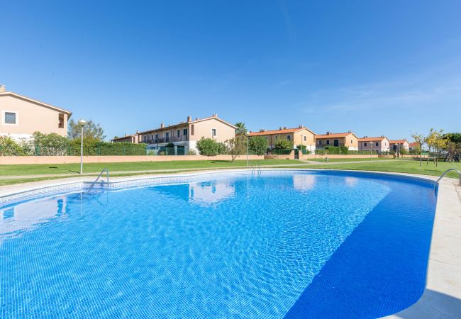 Vil.la en Torroella de Montgri - 1MP 44 - Casa adossada ubicada en un complex residencial tranquil amb piscina i jardins comunitaris a 100m de la platja de Pals Vil.la en Torroella de Montgri - 1MP 44 - Casa adossada ubicada en un complex residencial tranquil amb piscina i jardins comunitaris a 100m de la platja de Pals